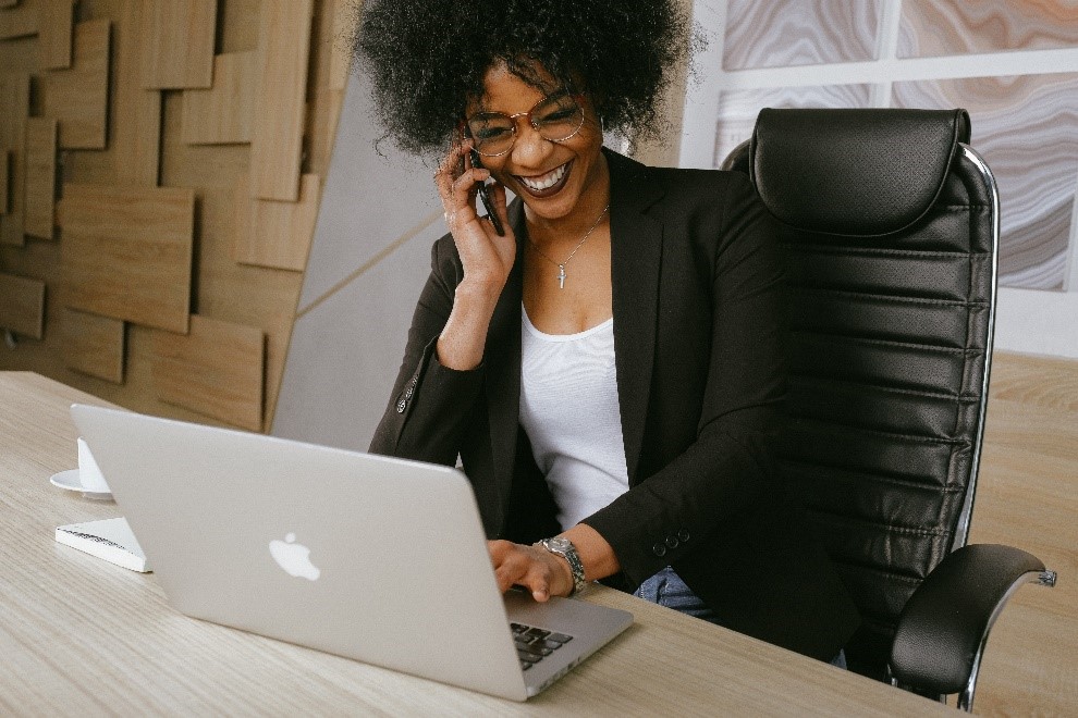 Woman smiling on call