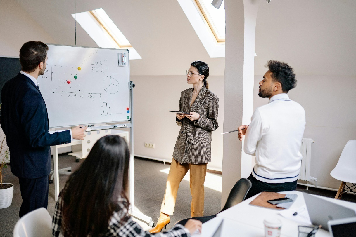 A group of professionals gathered at a meeting