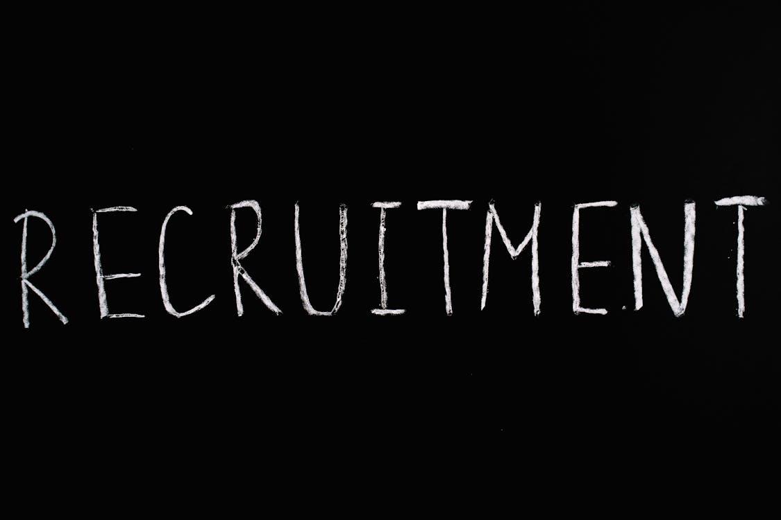 Recruitment text on a black background